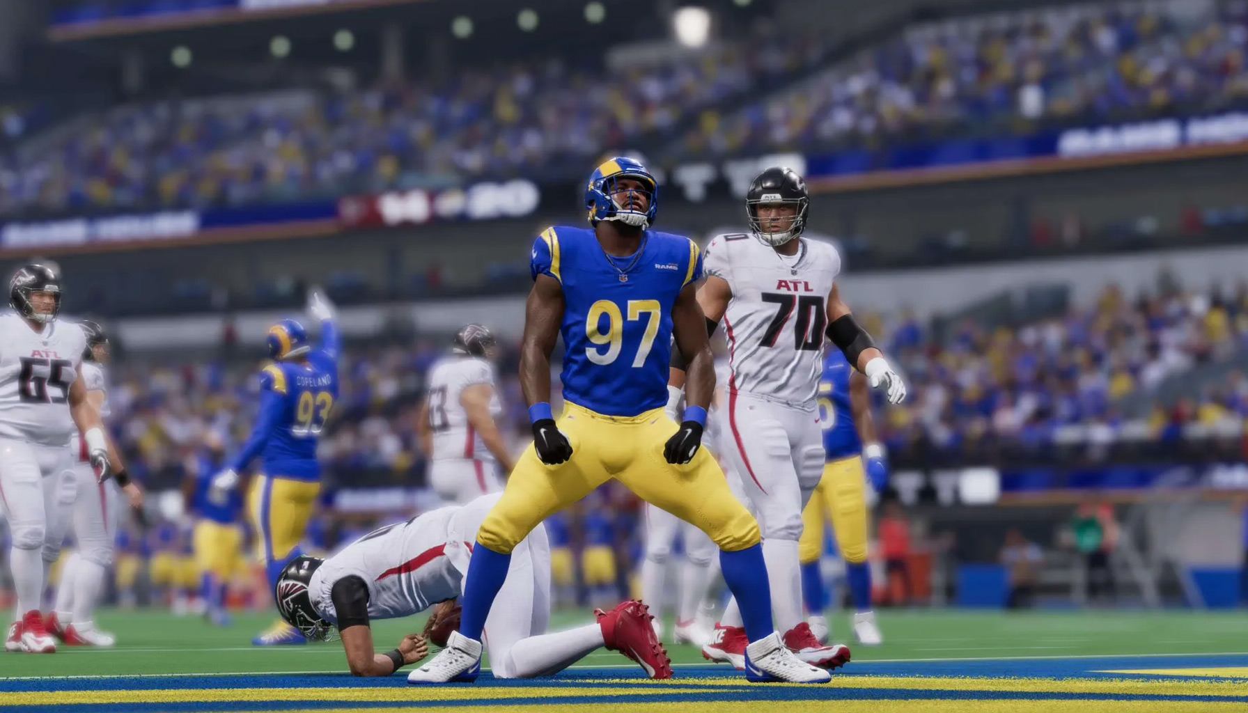 Rams Maurice Hurst celebrates after sacking Falcons quarterback Desmond Ridder