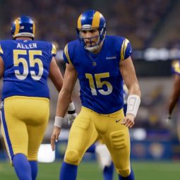 Los Angeles Rams quarterback George Johnson celebrates another touchdown in the end zone.