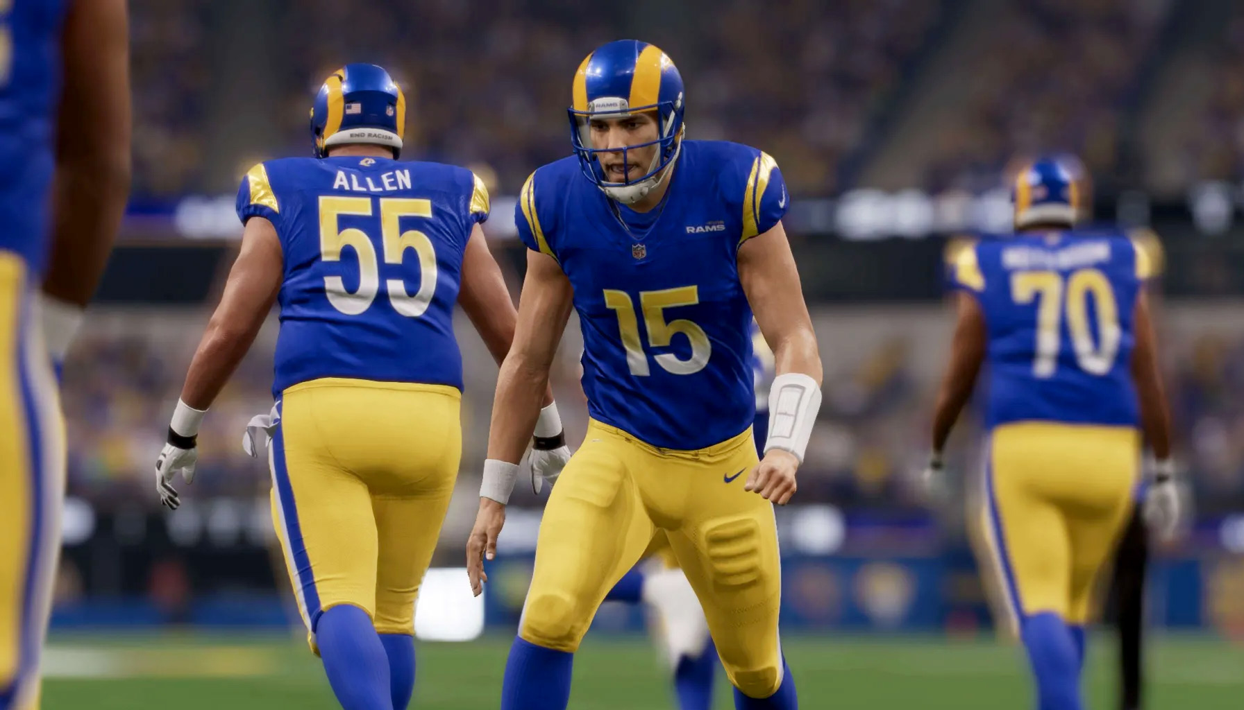 Los Angeles Rams quarterback George Johnson celebrates another touchdown in the end zone.