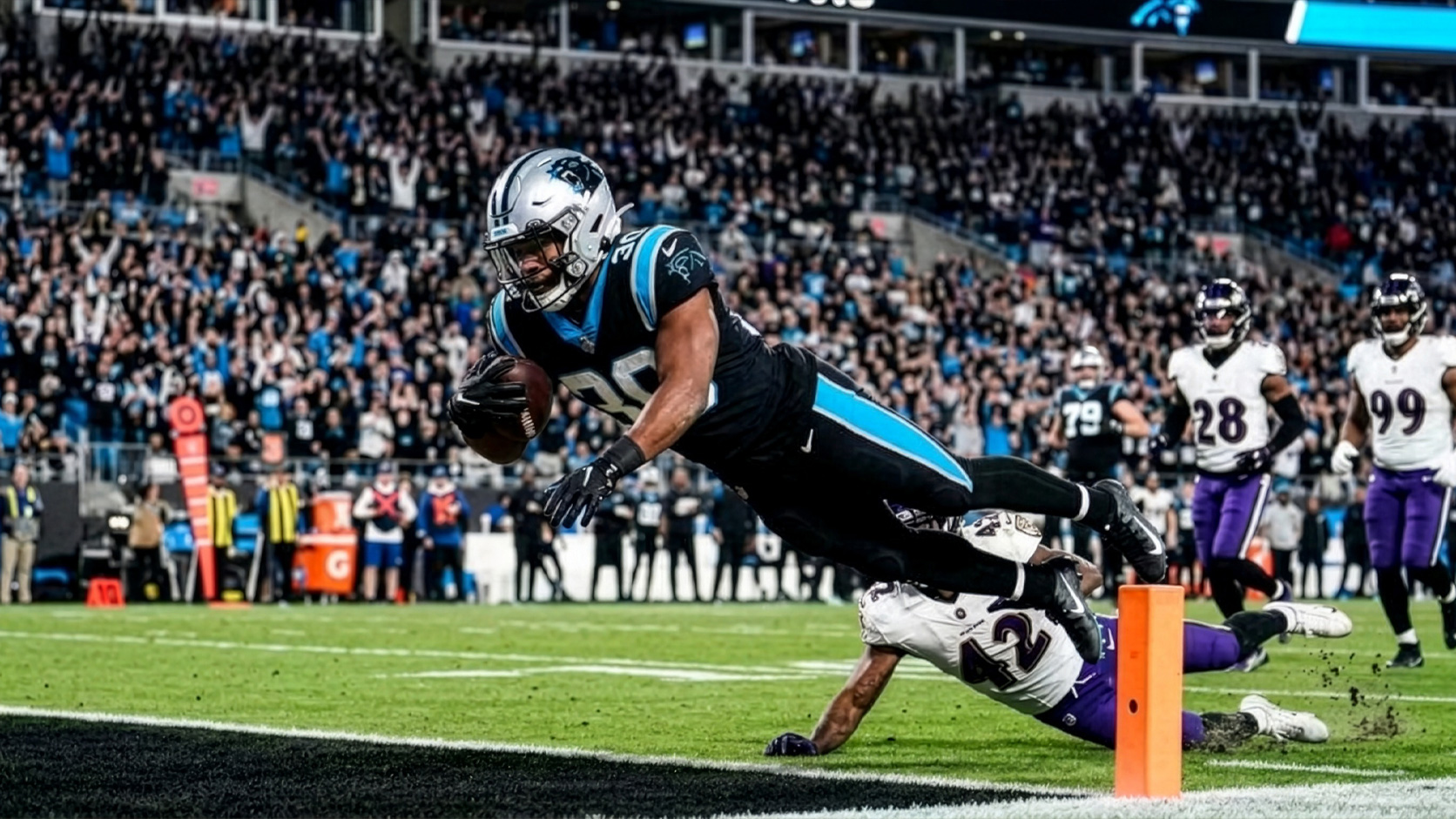 Brooks scores twice as Panthers end Ravens’ five-game streak, 31-23